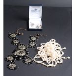 A simulated pearl multi-strand necklace, a pair of gem set white metal skull earrings and other