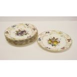 A set of eight Royal Worcester dessert plates, centres and borders decorated fruit