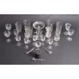 A collection of late 19th and early 20th Century drinking glasses with engraved decoration, etc