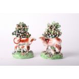A pair of 18th Century Derby porcelain cow and calf groups, 6" high (restorations)