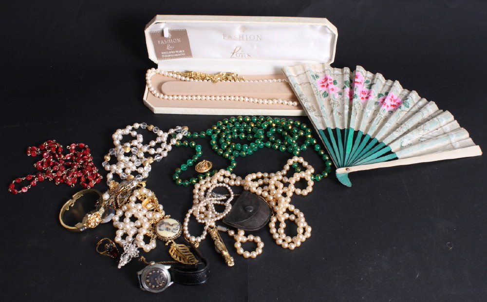 A number of strings of fashion pearls, costume necklaces and other costume jewellery, etc