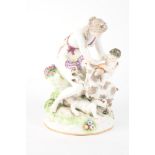 A 19th Century Berlin figure group of Venus with three putti and a goat, 9 1/2" high