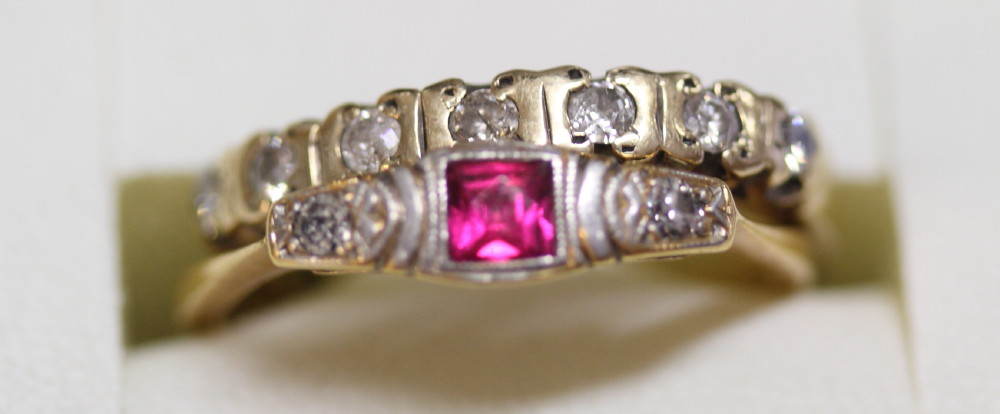 An 18ct gold, ruby and diamond set dress ring and a 9ct gold and diamond set dress ring