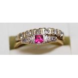 An 18ct gold, ruby and diamond set dress ring and a 9ct gold and diamond set dress ring