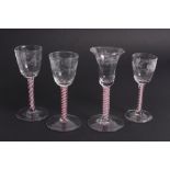 Three 18th Century wine glasses with ogee bowls engraved birds and blossom on red and white opaque