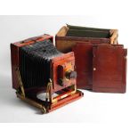 A Thornton Pickard mahogany and brass field camera, 6 1/2" x 4 3/4", with Aldis Uno astigmatic +7.