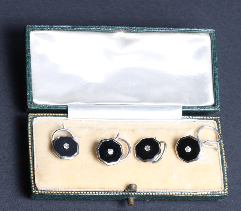 A cased set of four 9ct and 18ct gold, enamel and diamond dress studs, in fitted leather case