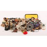 A large selection of costume jewellery to include bead necklaces, etc