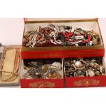 A quantity of costume necklaces, brooches, ear clips, etc