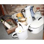 A white enamel fish kettle, enamel jugs and other decorative ceramic jugs