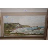 R Cresswell Boak: watercolours, coastal scene with waves breaking on rocks, 11" x 21", in gilt