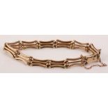 A 9ct gold gate bracelet, 13.2g