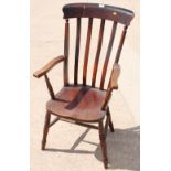 A 19th Century high lath back kitchen armchair