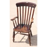 A 19th Century high lath back kitchen armchair