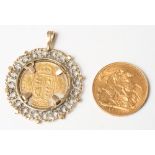 A gold half sovereign dated 1892 in later gold pendant mount and a gold sovereign dated 1913