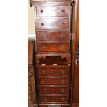 A pair of mahogany bedside chests, fitted four drawers, 17" wide, and a similar chest, 24" wide