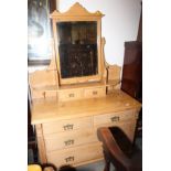 A Victorian stripped pine dressing chest of two short and two long drawers, 44" wide