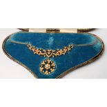 An Edwardian 15ct gold, diamond and seed pearl necklace of foliate design, in original velvet