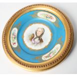 A 19th Century Sèvres style plate decorated with portrait on blue celeste ground (hairline crack), 9