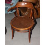 A late 19th Century bentwood elbow chair with circular seat