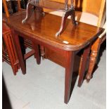 A 19th Century mahogany fold-over top tea table, on square taper supports, 36" wide