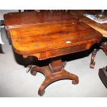 A Regency rosewood and brass inlaid fold-over top card table, on quadraform base, 36" wide