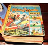 A collection of Mickey Mouse comics, 1976 to 1980, and a collection of children's annuals