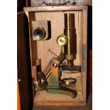 A student's 19th Century brass microscope, in mahogany case