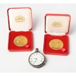 A silver cased open faced pocket watch with white enamel dial and subsidiary seconds dial and two