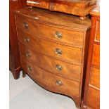 A Georgian mahogany bowfront chest of four long drawers with oval brass handles, on cutaway