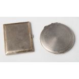 A silver cigarette case with engine turned decoration and a similar powder compact, 6.5oz troy