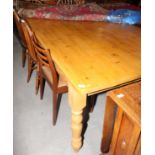 A pine rectangular kitchen table, fitted frieze drawer, on turned supports, 84" x 44"