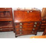 A Georgian mahogany bureau, fitted four lower drawers, 34" wide