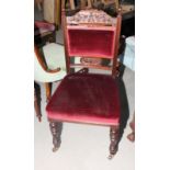 A late 19th Century mahogany framed nursing chair, upholstered in a red velour, and a standard
