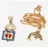 An Indian gold, enamel and seed pearl pendant, an 18ct gold and gem set dolphin pendant and a 9ct