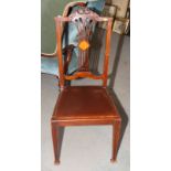 A set of three Edwardian and satinwood inlaid splay back dining chairs with drop-in seats, on square