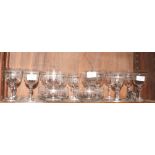 A part suite of early 20th Century drinking glasses, etc, with engraved bands