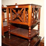 A 19th Century rectangular mahogany four-division music canterbury, on bobbin turned supports fitted