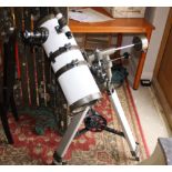 A Newtonian 1400/150 reflector telescope, on tripod stand with German equatorial mount