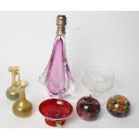 A Val Sant Lambert amethyst glass lamp base, two glass paperweights, a pair of glass knitting