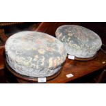 A pair of Victorian circular footstools, upholstered in an embossed blue velour
