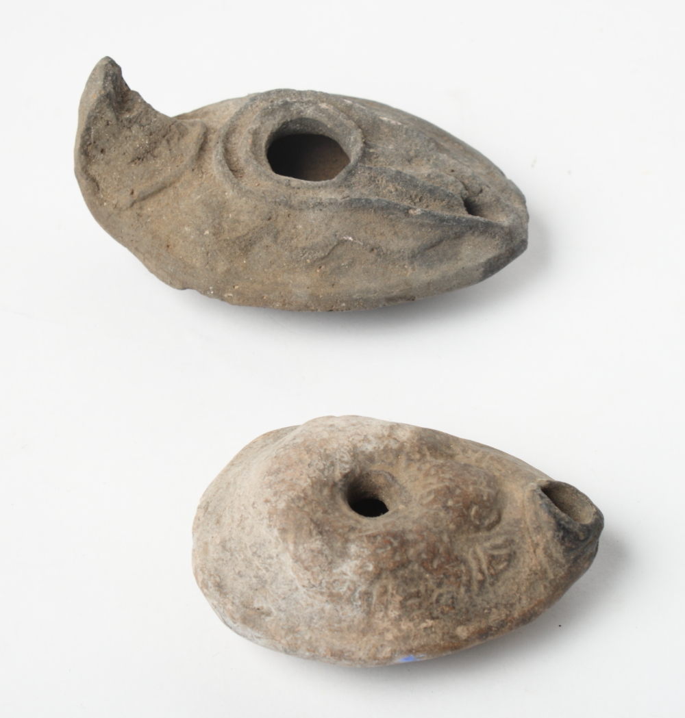 Two Roman pottery lamps, 4 1/2" long max