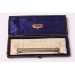 A Negretti & Zambra 6" ivory parallel ruler, in fitted case