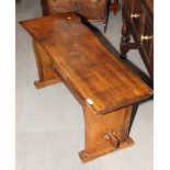 A pair of oak benches, on slab end supports, 45" long