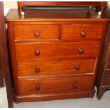 A Victorian mahogany chest of two short and three long drawers