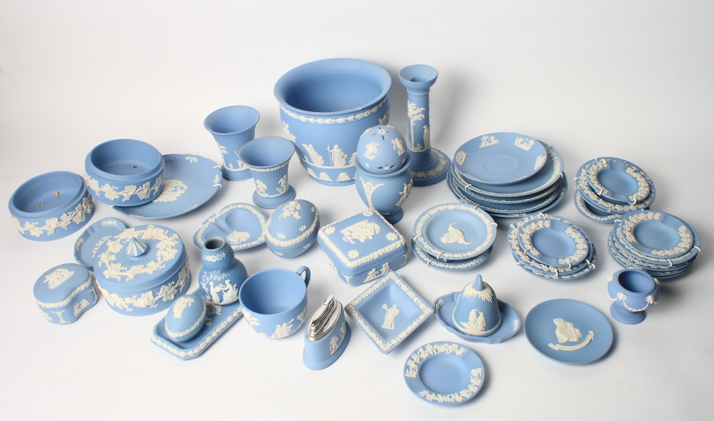 A quantity of Wedgwood blue jasperware commemorative dishes and other decorative items