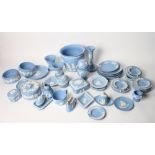 A quantity of Wedgwood blue jasperware commemorative dishes and other decorative items
