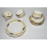 A Paragon china teaset decorated yellow and black with triangular floor panels