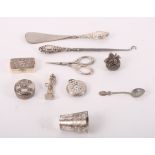 A Siam silver rectangular pill box, a white metal pill box, a silver cased fob watch and other