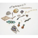 A selection of Tibetan and Eastern white metal and silver stone set jewellery and a Persian